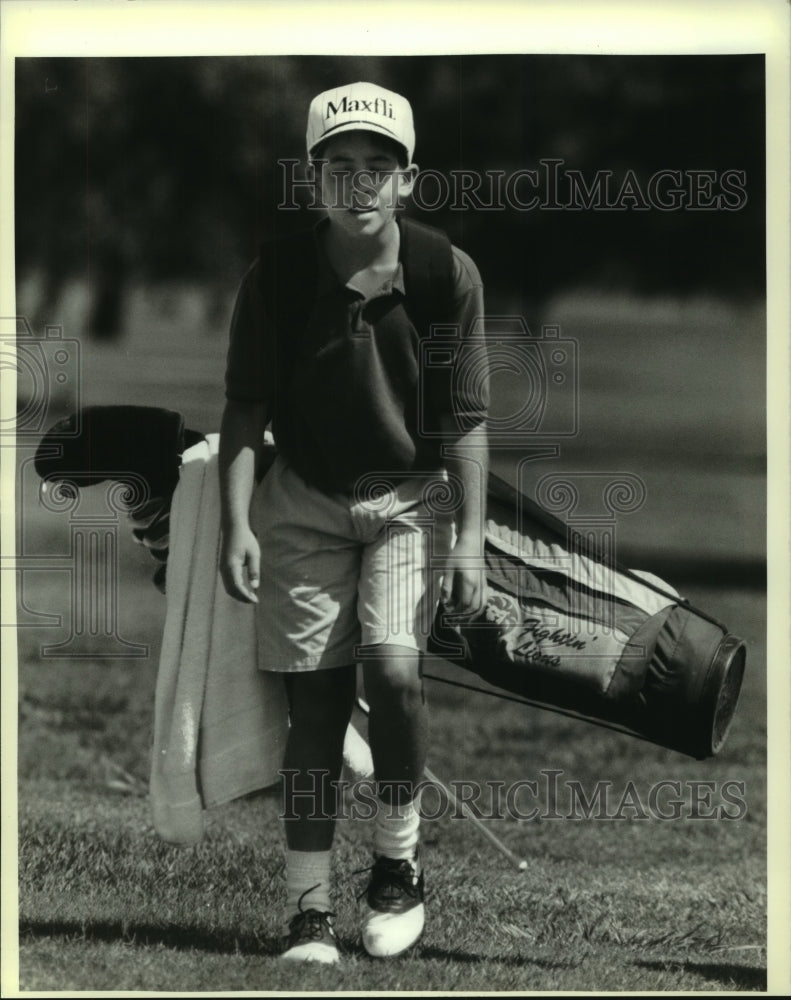 1993 Press Photo Junior Golfer Chad Godbery spent the day picking up golf tips. - Historic Images