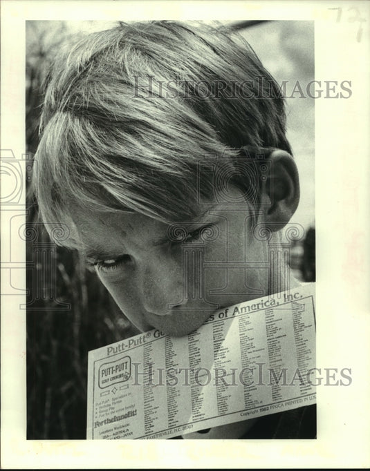 1982 Press Photo Scott Gilbert makes a face at Putt Putt Golf Course - nob24903 - Historic Images