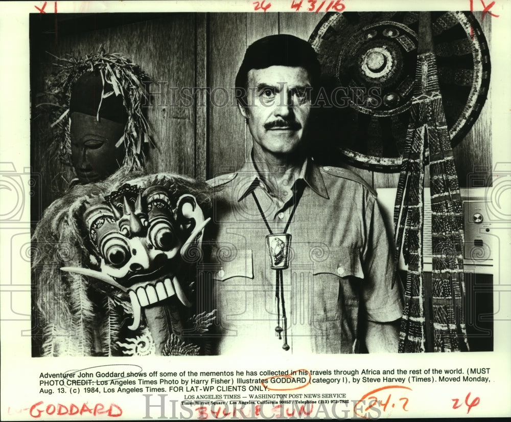 1984 Press Photo Adventurer John Goddard shows mementos collected from Africa - Historic Images