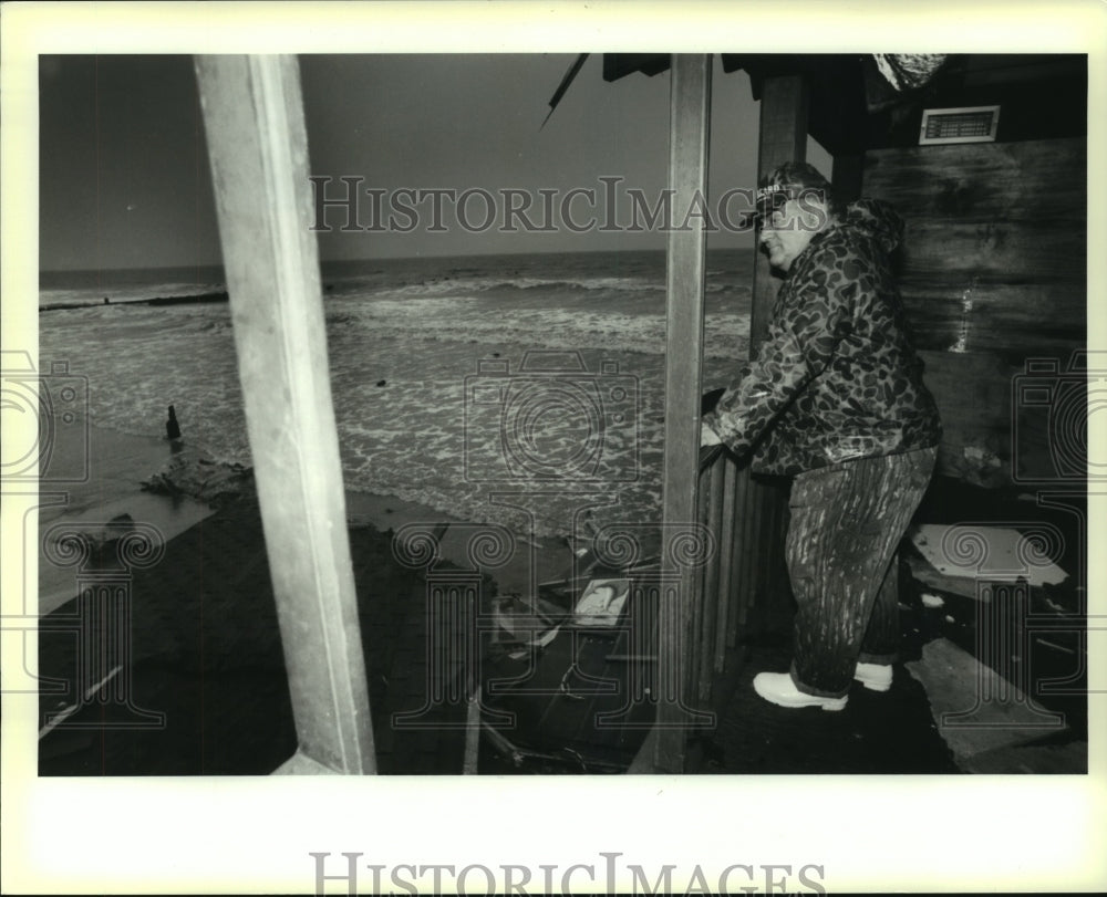 1991 Press Photo State Senator Leonard Chabert surveyed the damage in Grand Isle - Historic Images