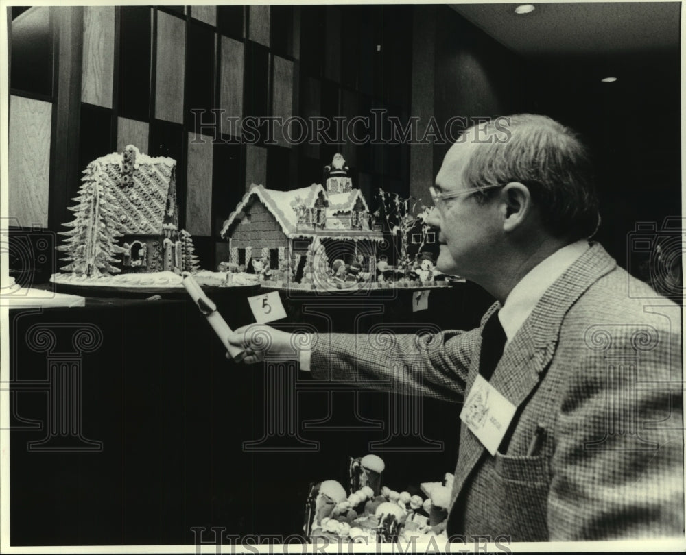 1979 Press Photo Gingerbread House being scrutinized by a judge - nob25277 - Historic Images