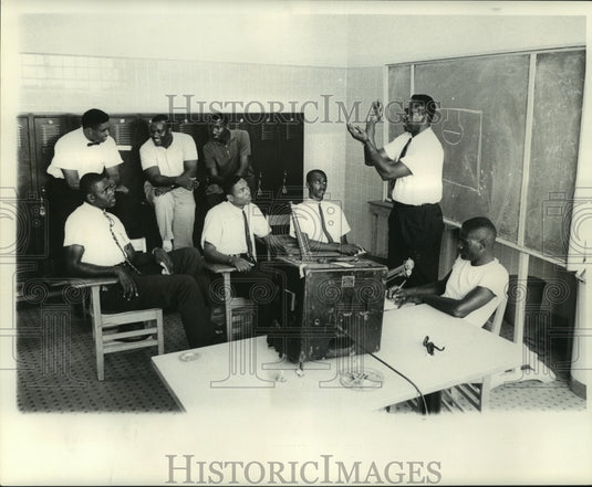 1962 Press Photo Top sports figure discuss strategy for next football game-Historic Images
