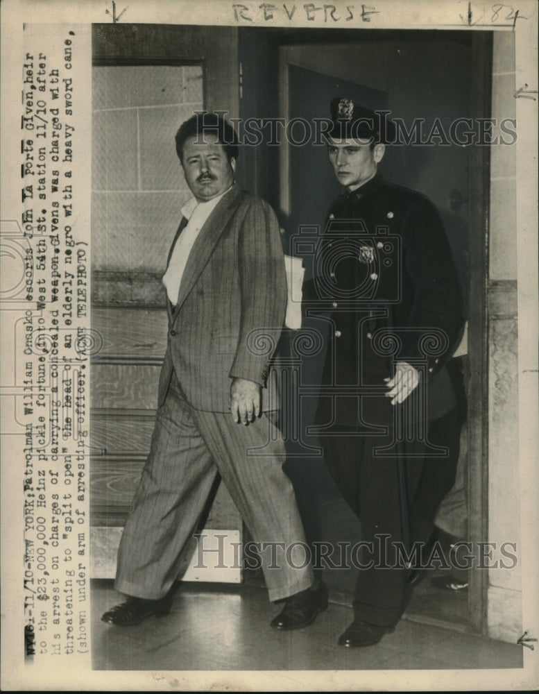 1948 John La Porte Given brought to 54th Street Police station - Historic Images