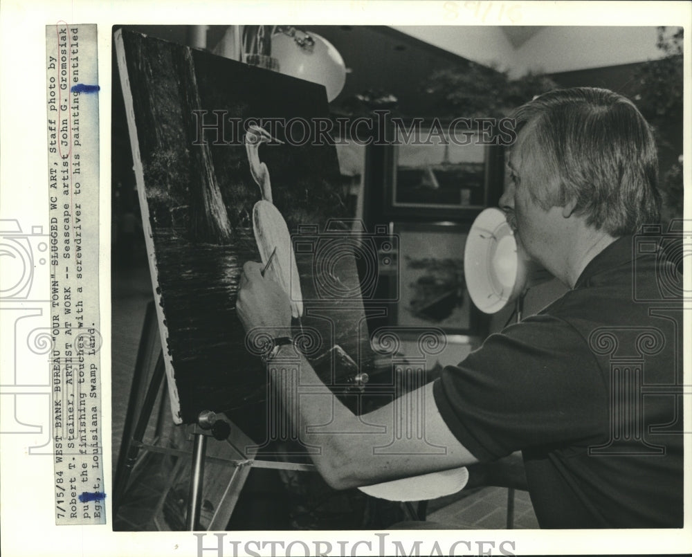 1984 Press Photo John G Gromosiak with Egnet, Louisiana Swamp Landscape painting - Historic Images