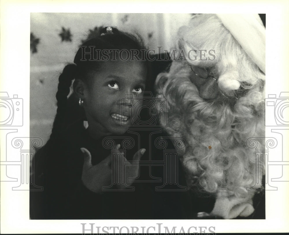 1990 Press Photo Six-year-old Christina Hayes telling Santa her Christmas List - Historic Images