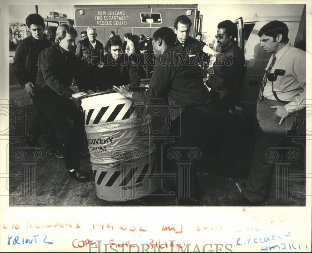 1983 Police with barrel of hazardous material, Municipal Auditorium - Historic Images