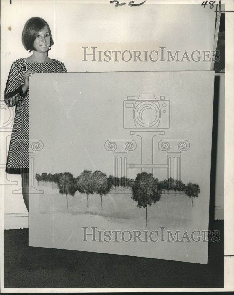 1967 Press Photo Linda Goldman of Orleans Gallery with James Fisher&#39;s landscape - Historic Images