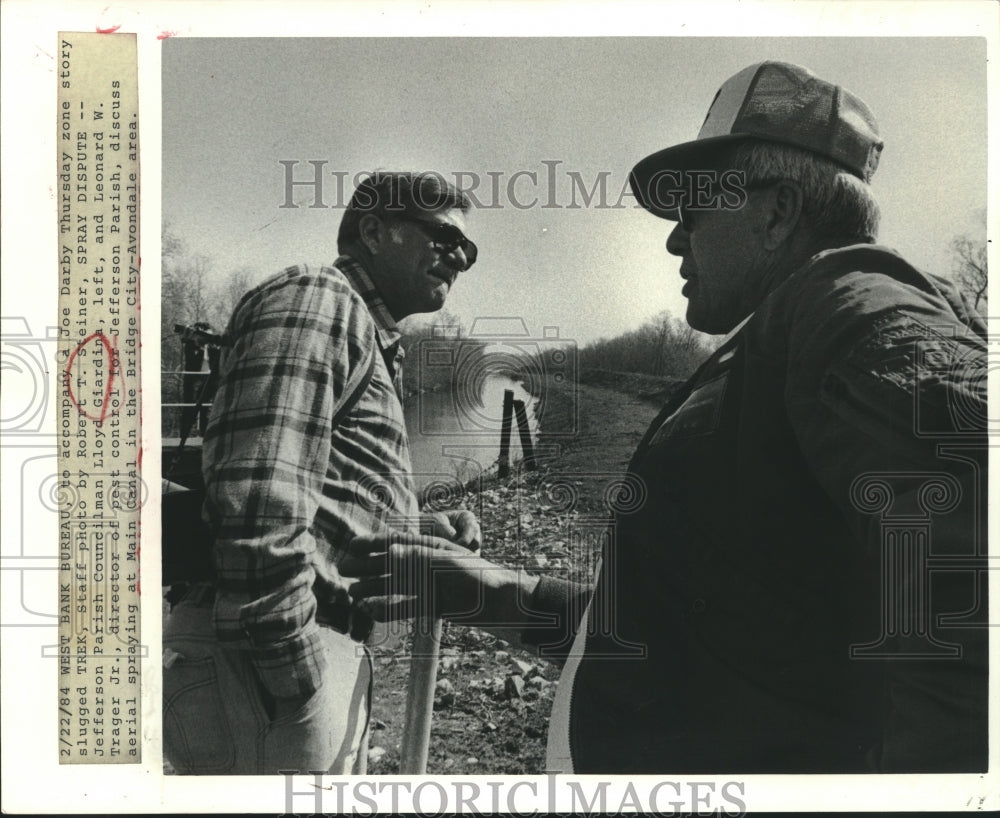 1984 Councilman Lloyd Giardina &amp; Leonard Trager Jr. Discuss Spraying - Historic Images