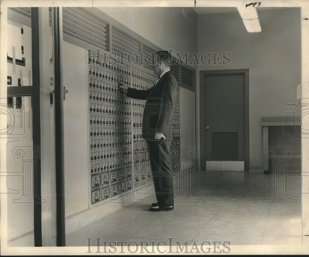 1961 Press Photo Harahan Mayor Donelon checks post office boxes - nob30059 - Historic Images