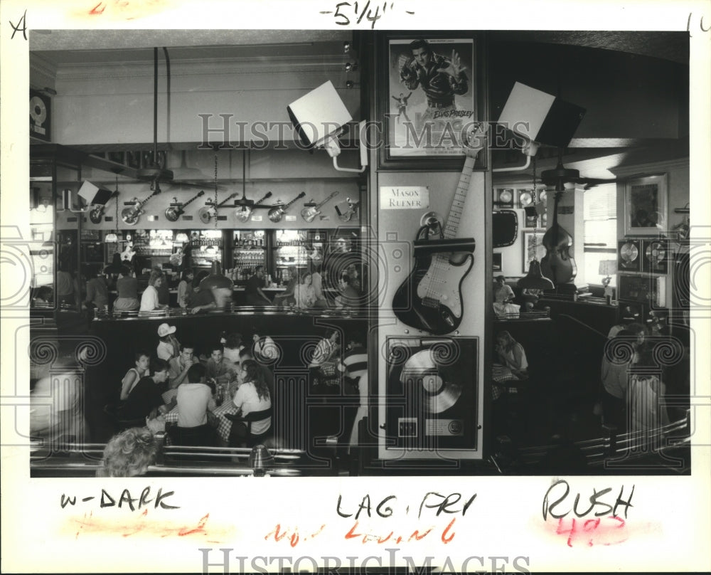 1988 The interior of the Hard Rock Cafe displays rock &amp; roll stuff - Historic Images