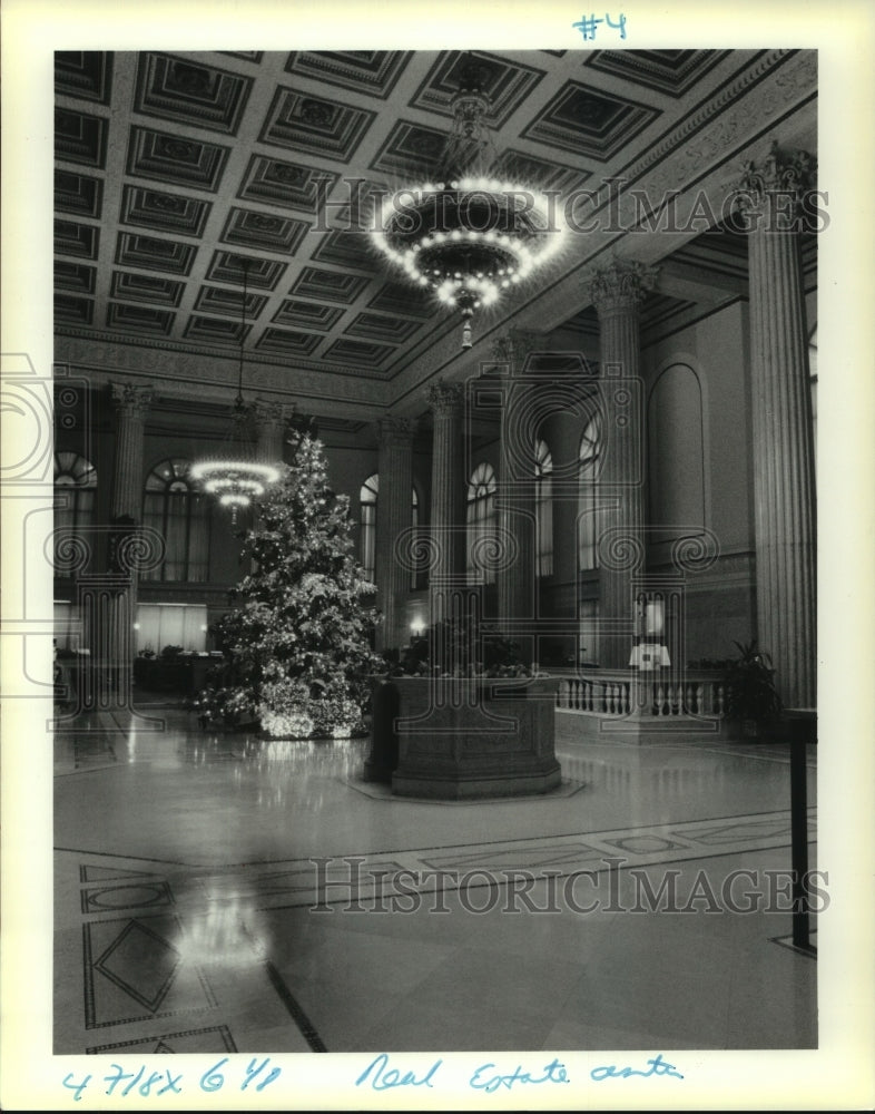 1990 View inside the holiday decorated lobby of Hibernia Bank - Historic Images