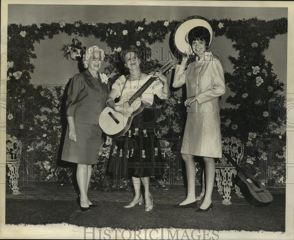 1969 Female entertainers at social gathering - Historic Images