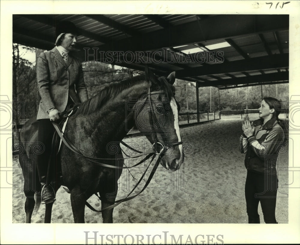 1979 Auriel Hessemer on horseback instructed by Gwen Stockebrand. - Historic Images