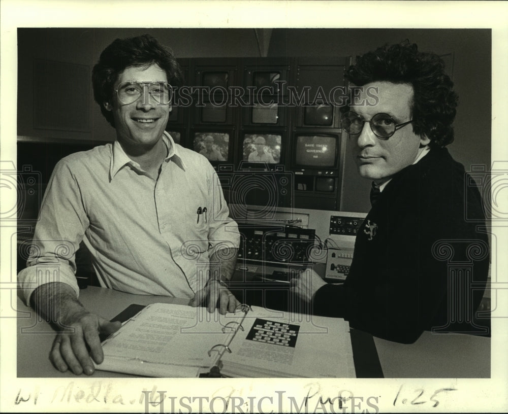 1983 Bill Hess and Roy Fletcher during editing of a commercial. - Historic Images