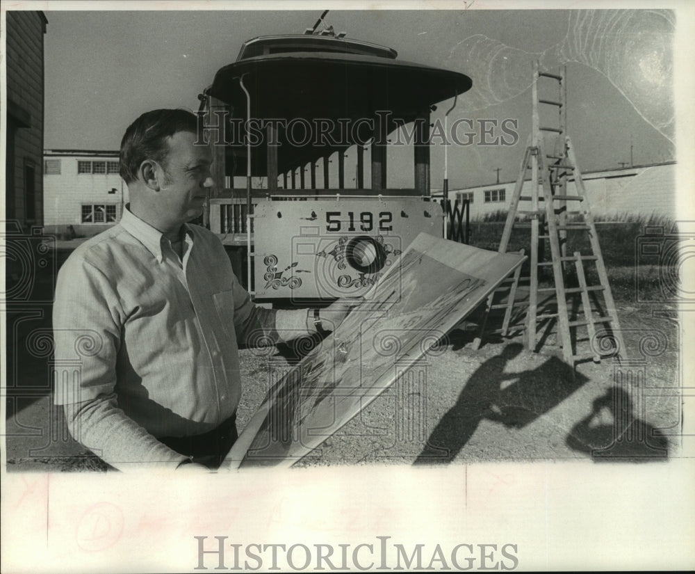 1968 Press Photo Parade Designer Earl C. Hargrove Jr. with Sketch by Streetcar - Historic Images