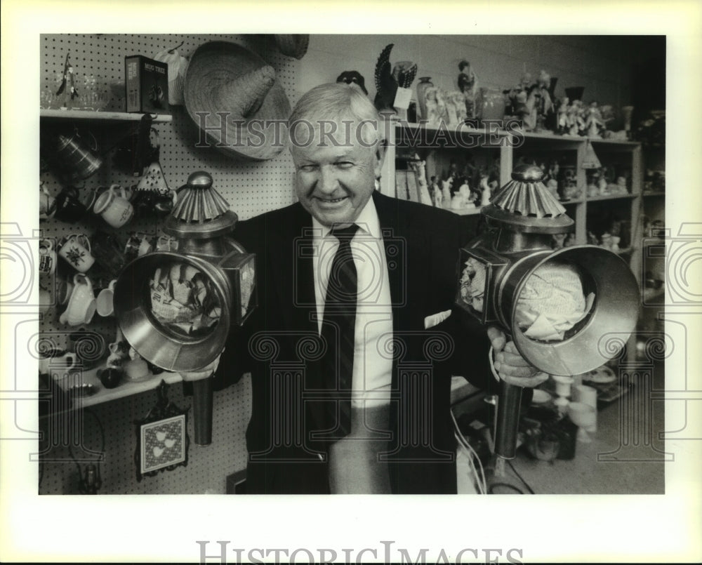 1990 Carl Handley of Old Stuff Antiques holds Egyptian Surrey Lamps - Historic Images