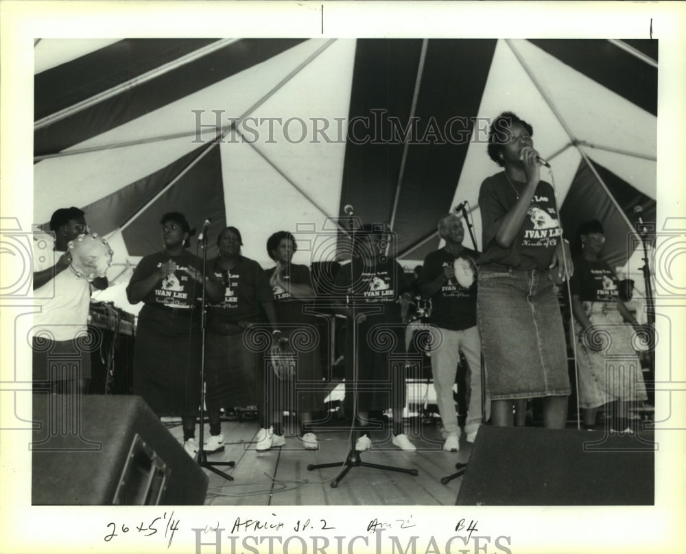 1993 Herald of Christ members perform at African Heritage Festival - Historic Images