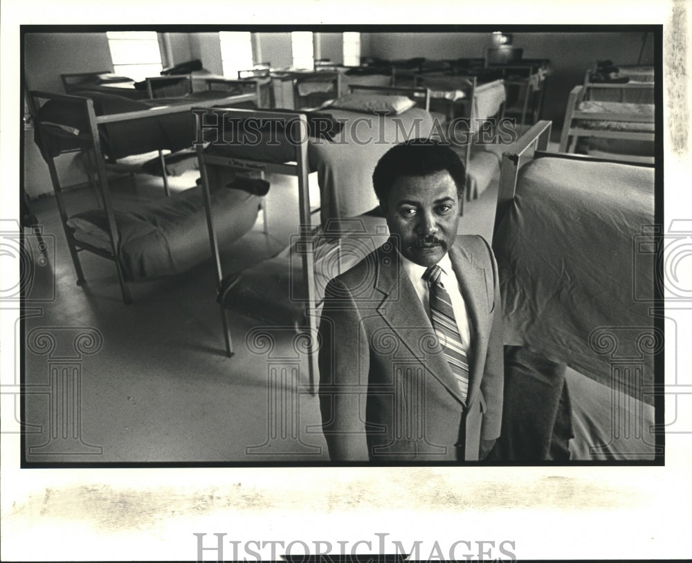 1983 LTI Director Benny Harris shows off a dorm room for 40 boys - Historic Images