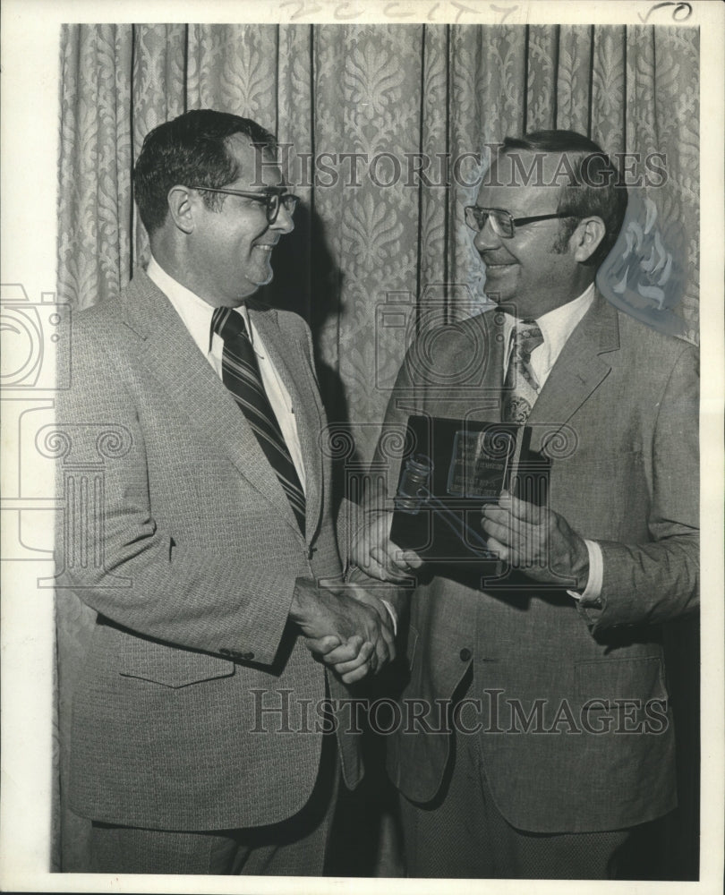 1970 Dr. Ronald George presented an award to Dr. Stephen Herbert - Historic Images