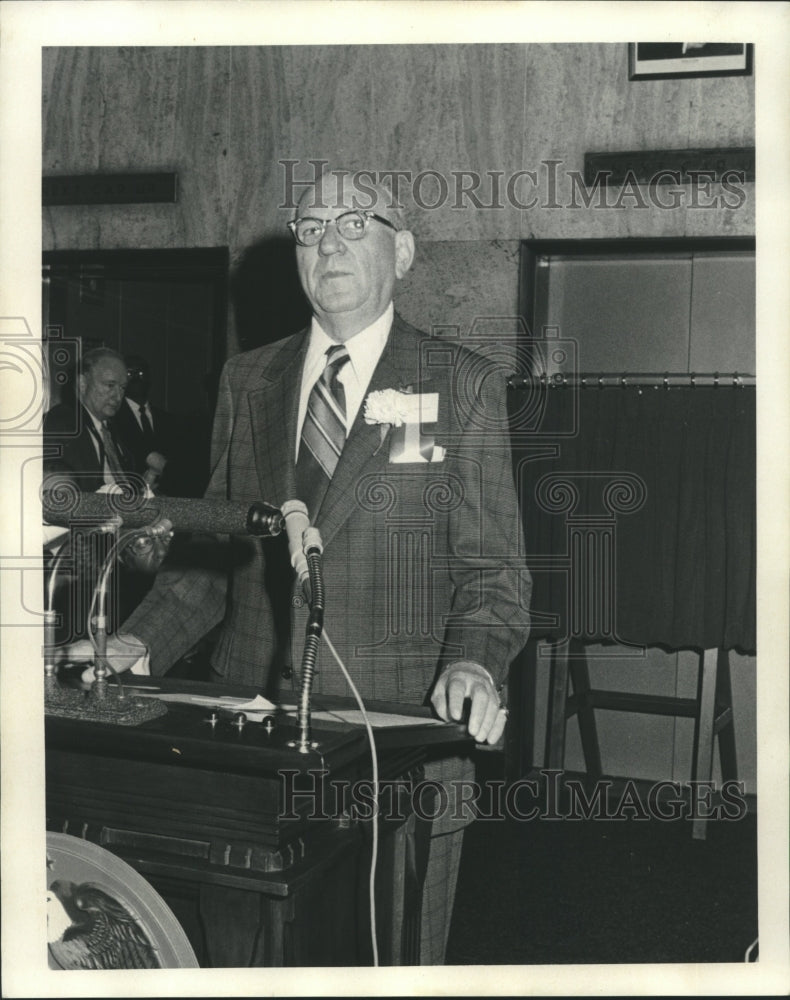 1975 F. Edward Herbert at the podium. - Historic Images