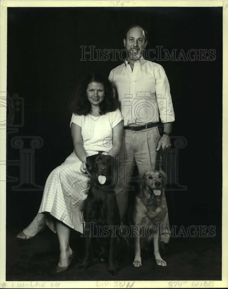 1986 Press Photo Pierre and Monica Hilzim with their dogs Megan &amp; Lord Winston - Historic Images