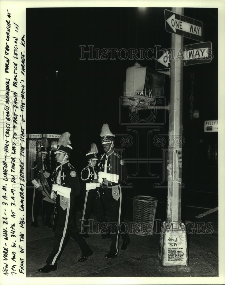 1987 Press Photo Holy Cross band members on their way to practice session - Historic Images