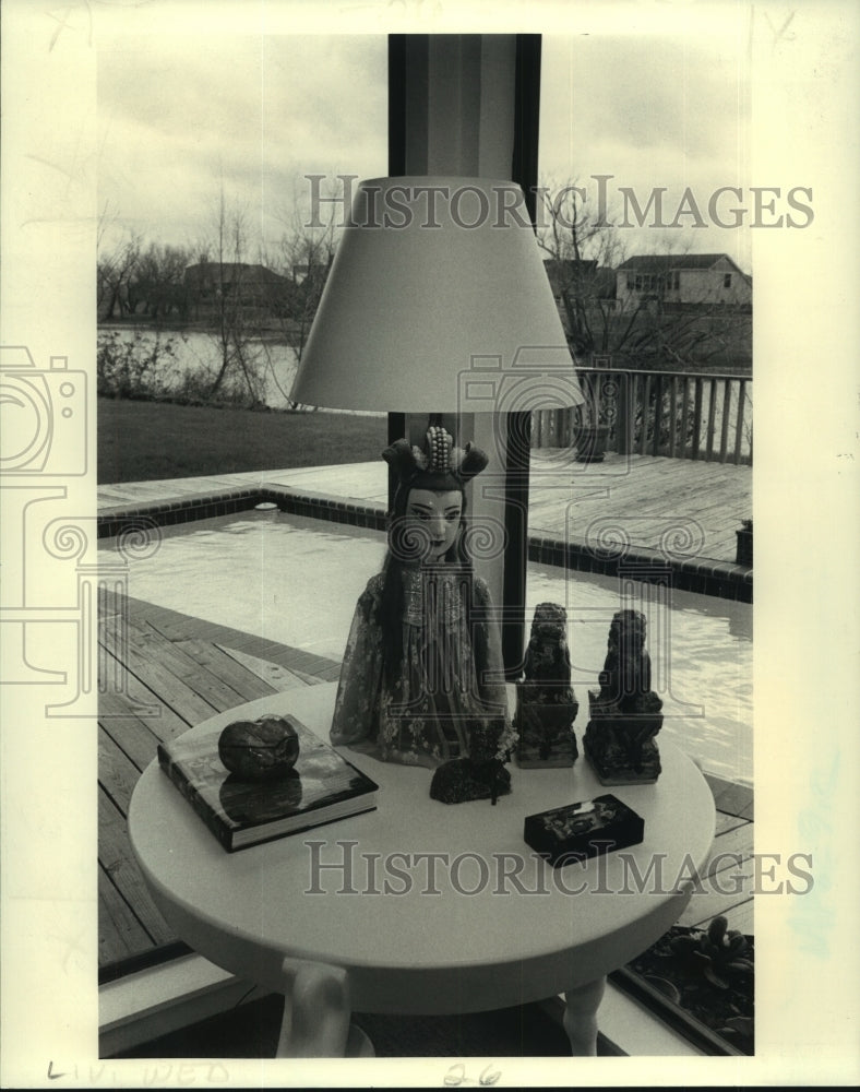 Press Photo An antique, Chinese puppet has new life and light as a lamp - Historic Images