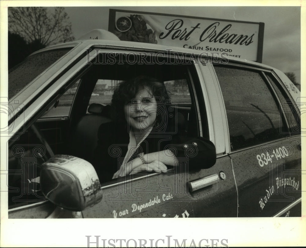 1994 Press Photo Mary Pat Holt in one of the cabs with a rooftop ad - Historic Images