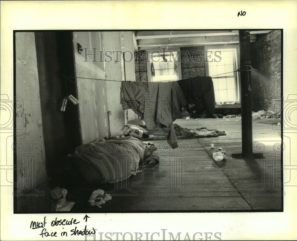 1996 Press Photo A homeless man asleep inside an abandoned building - nob35832 - Historic Images