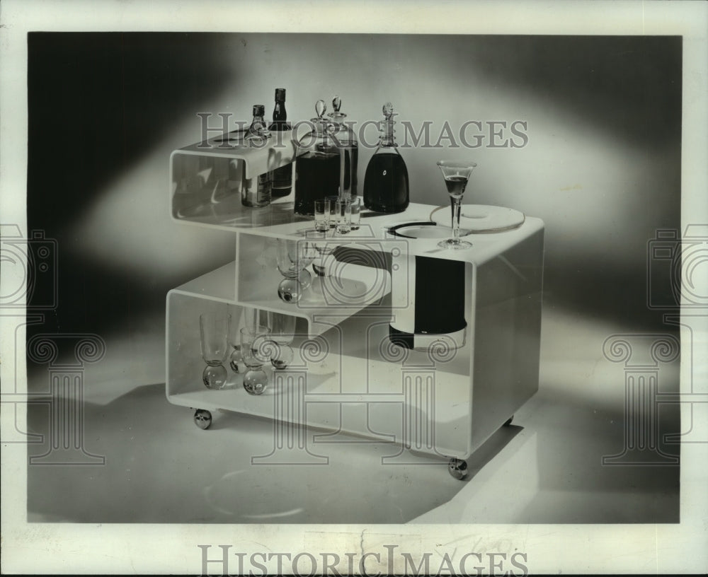 1974 Press Photo Constructed of molded plexiglass with chrome casters - Historic Images