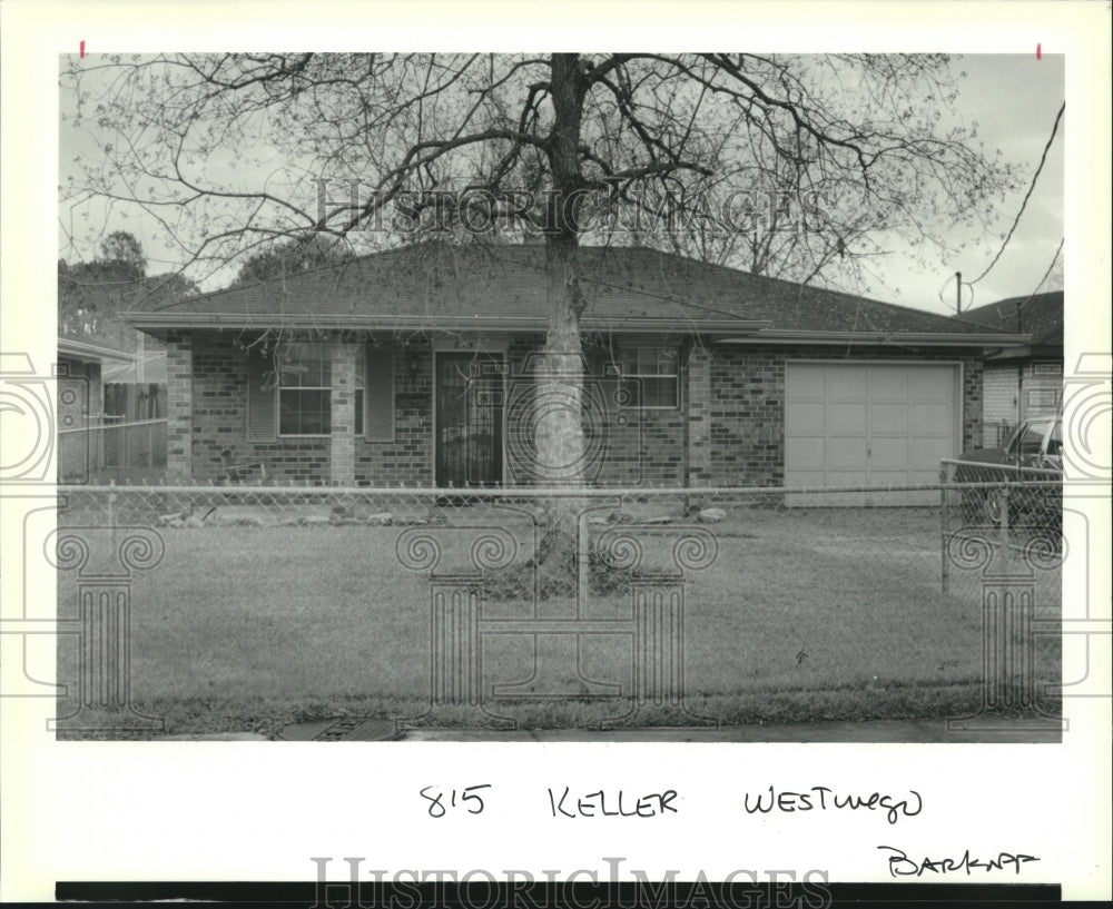 1990 Press Photo Home with fenced yard &amp; one car attached garage at 815 Keller. - Historic Images