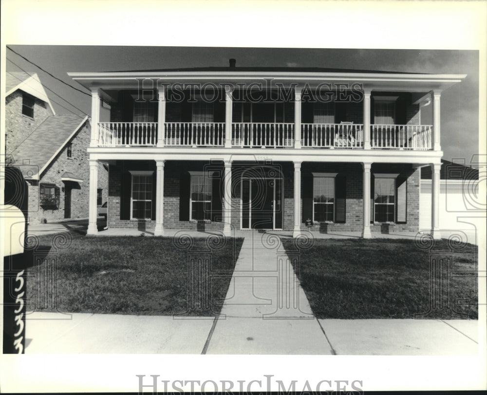 1989 Press Photo Two story brick home at 5533 Janice Lane, Metairie. - Historic Images