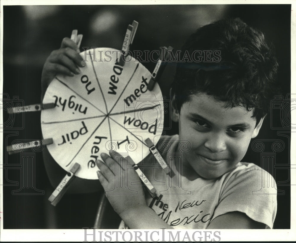 1987 Press Photo Marco Pinon shows off perfect score on Hymonym matching game - Historic Images