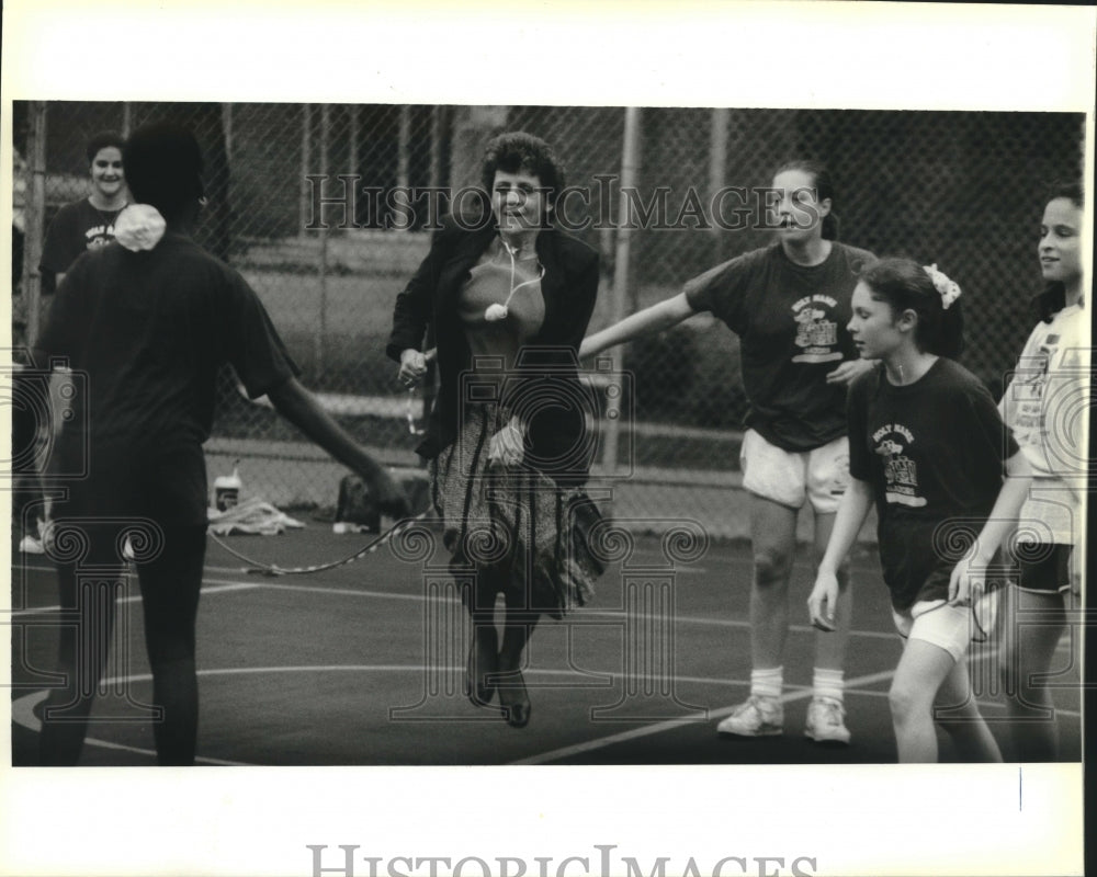 1993 Press Photo Principal Sister Mary Nicholas Schiro jumps rope for heart. - Historic Images