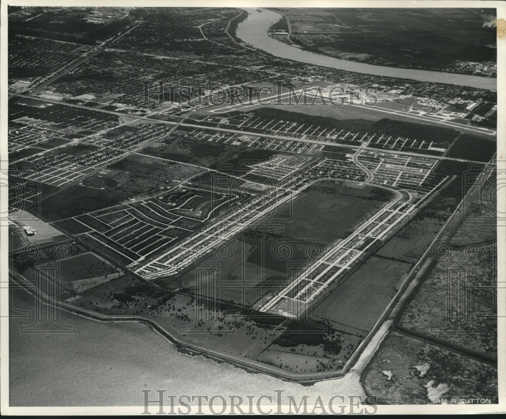 1973 Aerial view of housing and airport. - Historic Images