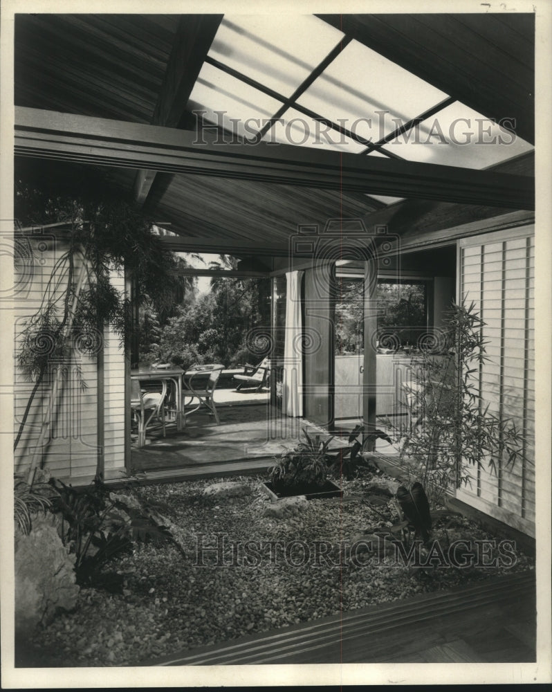 1961 This garden has sliding Shoji Screens on three sides. - Historic Images