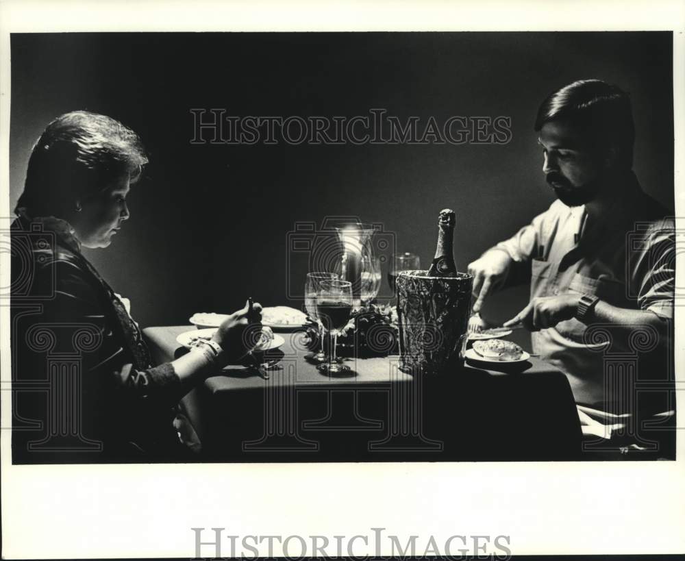 1984 Darlene and Tom Bowers dining by candlelight at Humana Hospital - Historic Images