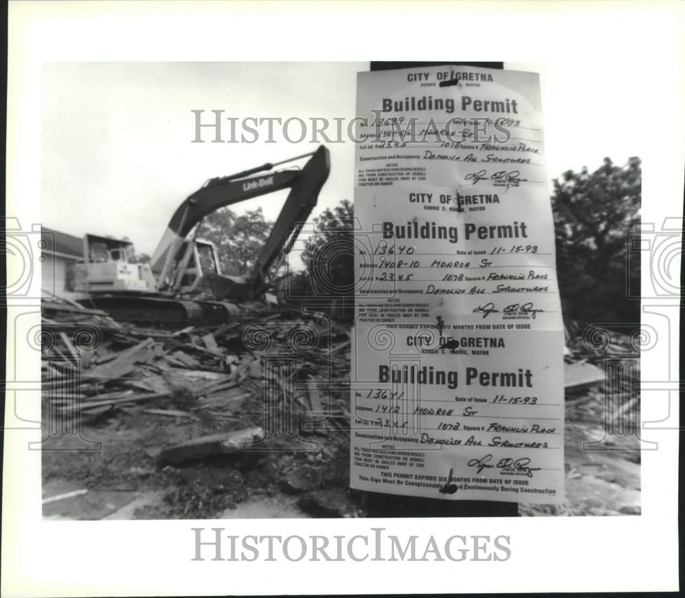 1994 Permits for the demolition of the three houses on phone pole - Historic Images