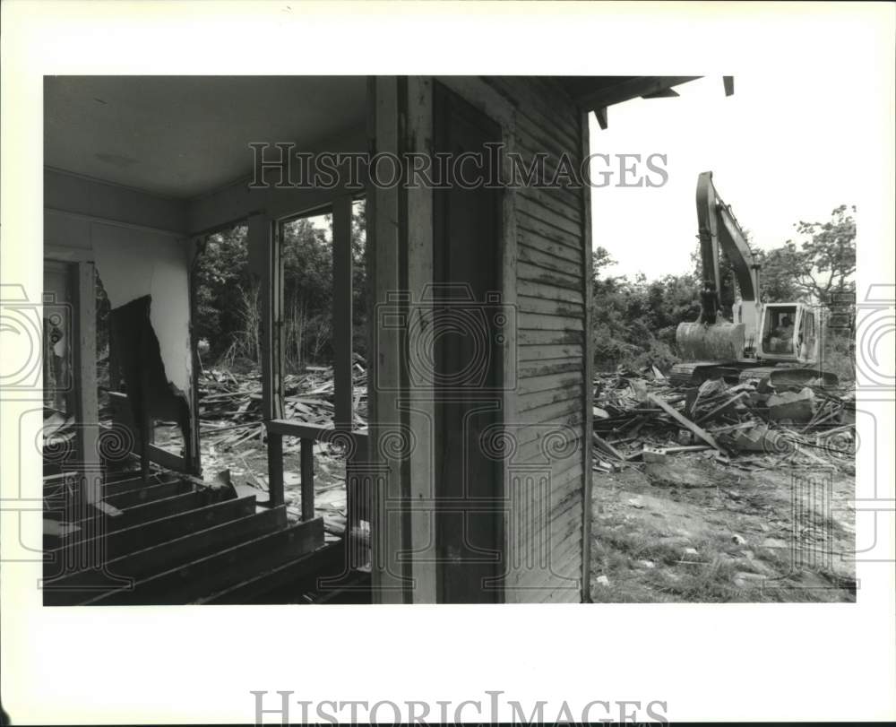 1994 Demolition of the house at 1404-05 Monroe - Historic Images