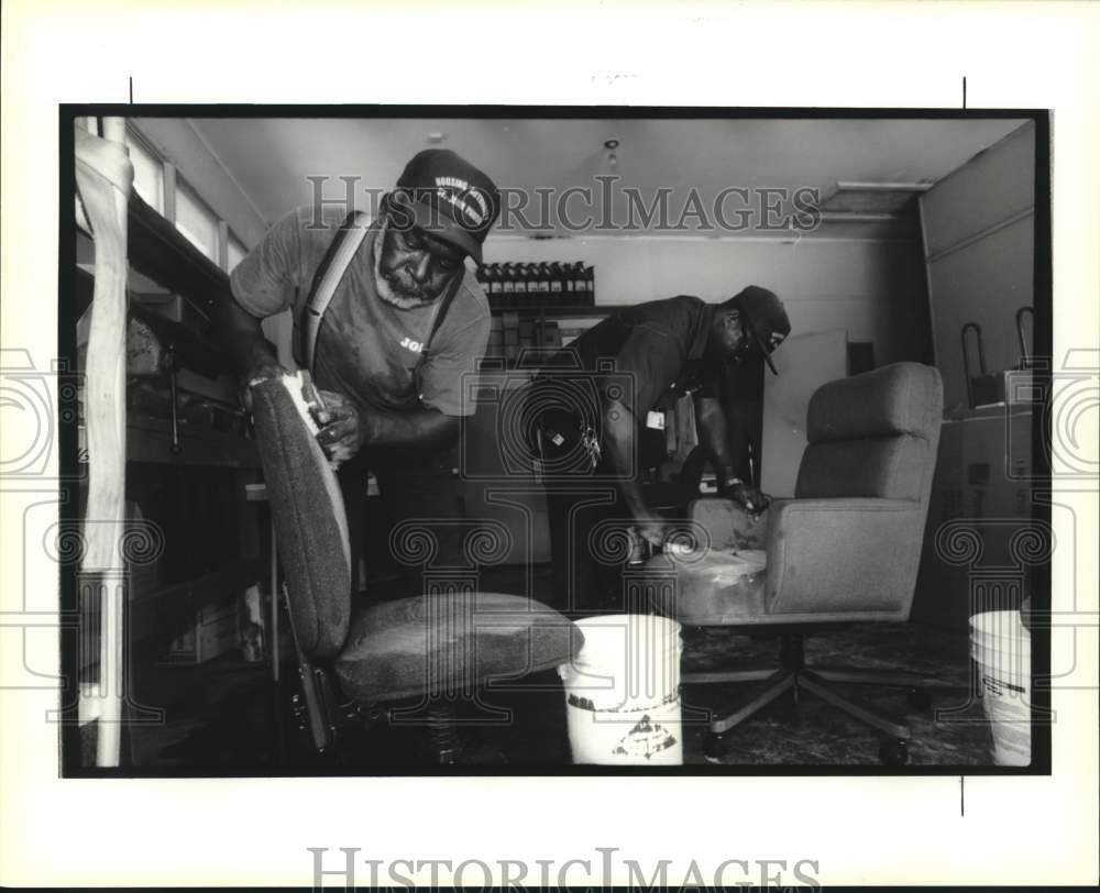 1994 Leo Johnson & Malcolm Louis scrub chairs damaged by smoke - Historic Images