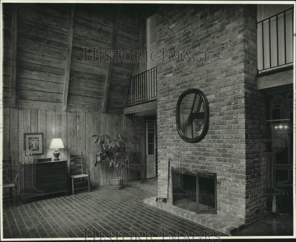 1981 Real estate photo of interior of a house featuring fireplace. - Historic Images