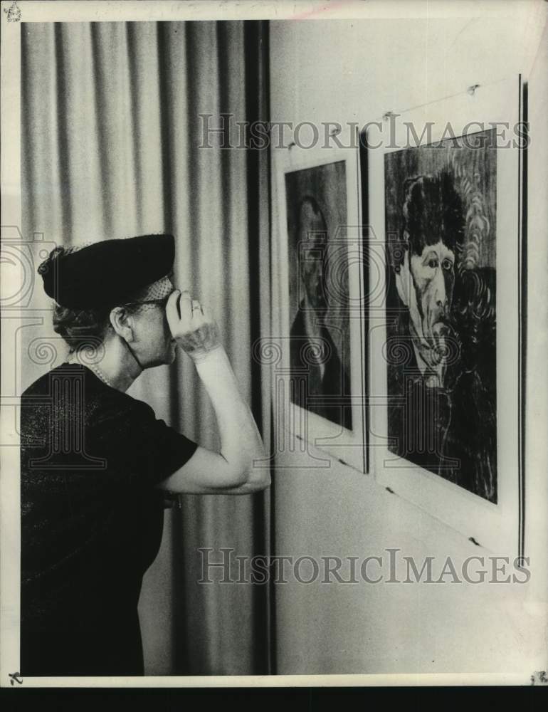 1967 Lucerne, Switzerland visitor examines controversial Van Goghs - Historic Images