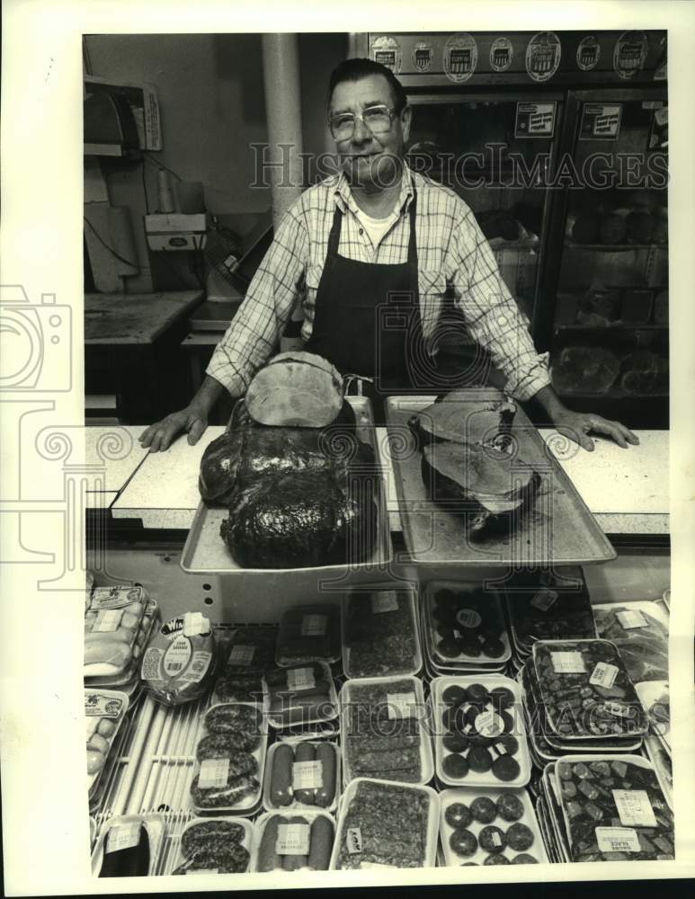 1983 Buddy Hodgkins with fine selection of meats at Langenstein&#39;s - Historic Images