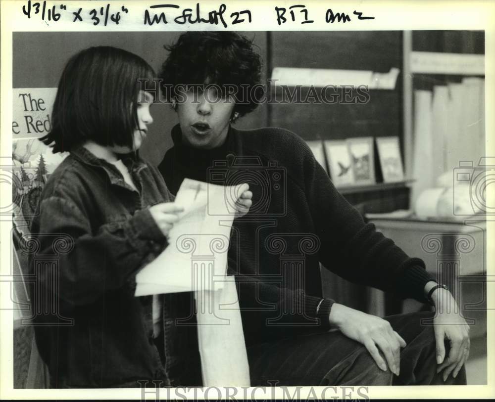 1991 Teacher Margaret Hunter helps Abita Springs student Kate Patton - Historic Images