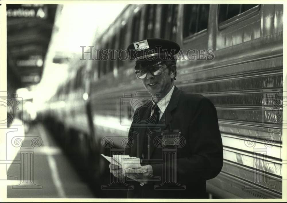 1993 Amtrack conductor Larry Hull at Washington, D.C., Union Station - Historic Images