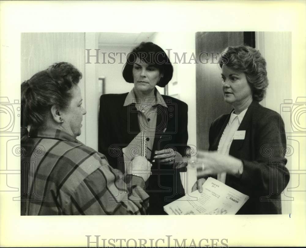 1989 Female Hospice Volunteers Meet in Hallway - Historic Images