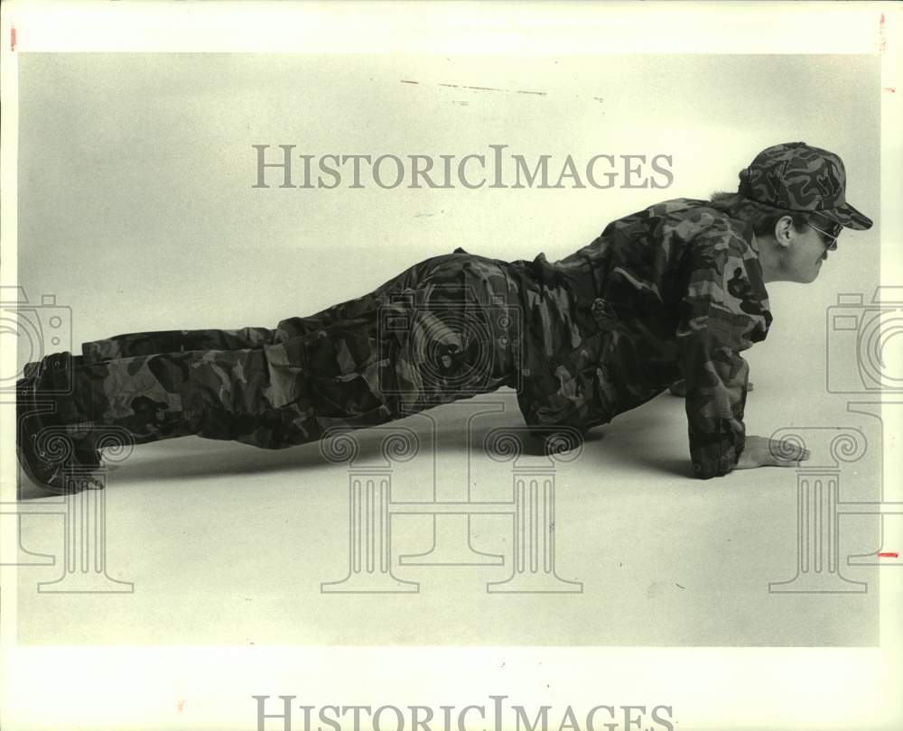 1985 Push ups to help strengthen arms &amp; shoulders for hunting - Historic Images