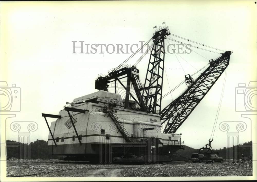 1989 Miner is dwarfed by towering coal at Hobet Mining, Incorporated - Historic Images