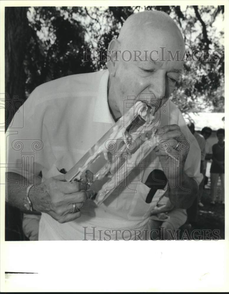 1992 Henry Collins at St. Anselm&#39;s ice cream social in Madisonville - Historic Images