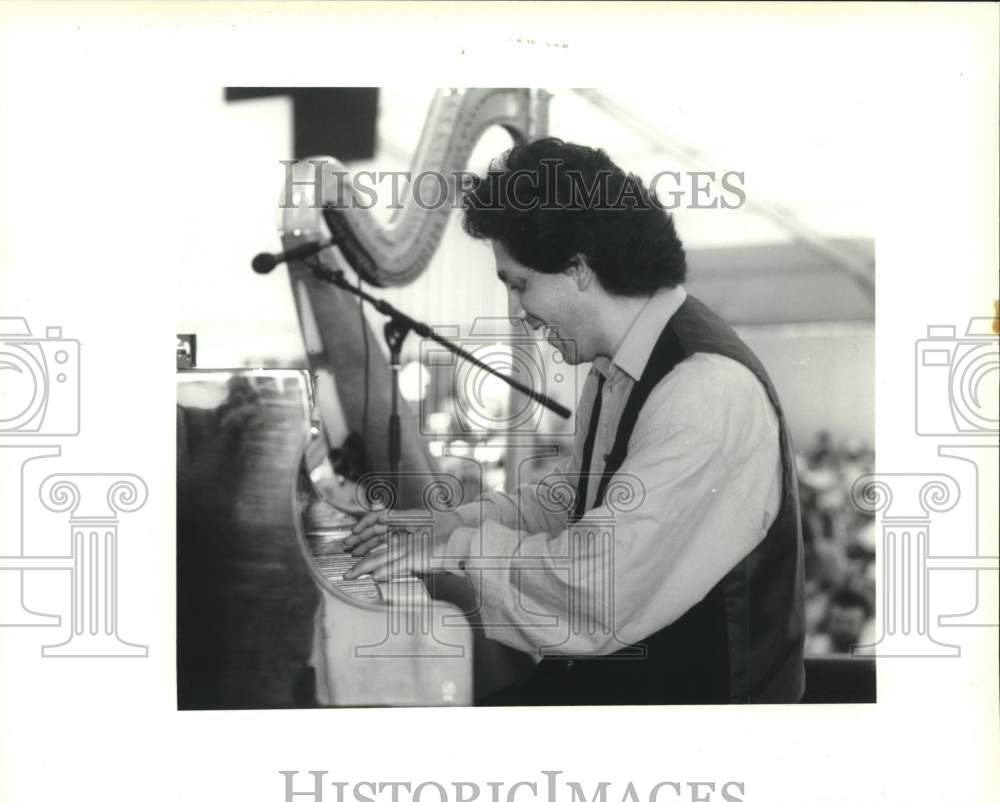 1995 Press Photo Hector Infanzon performed at the WWOZ Jazz tent at Jazz Fest - Historic Images